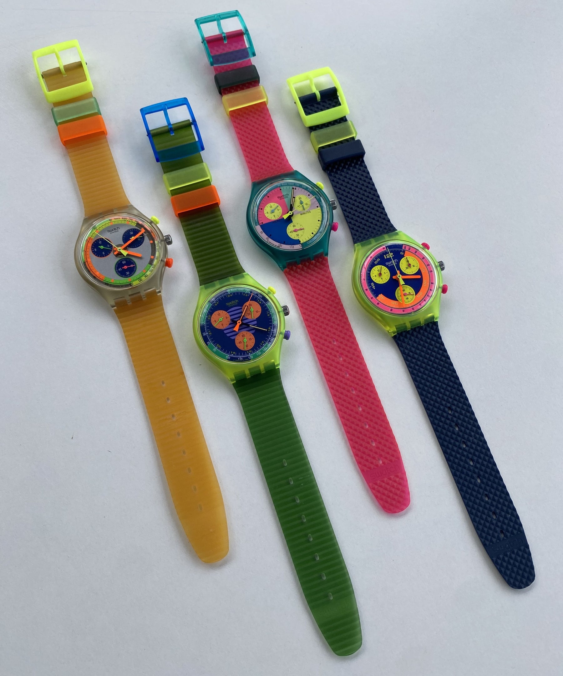 Four colourful vintage Swatch Chronograph watches photographed for the Irish Independent article featuring Swatch Vintage Collection.